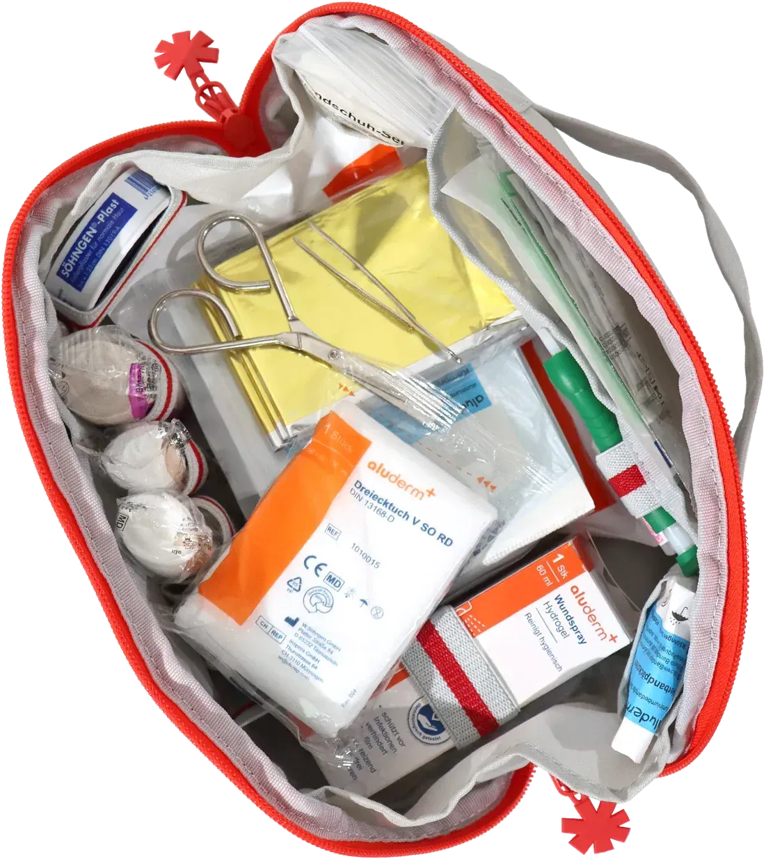 Blick in die geöffnete Erste-Hilfe-Tasche mit Verbandmaterial